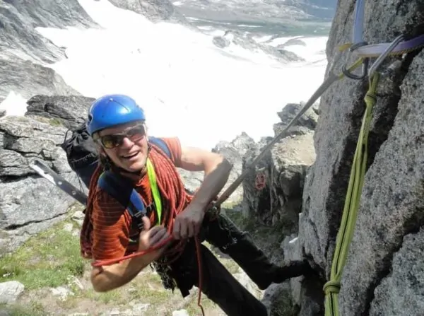 Kel Rossiter rapping down from Forbidden Peak