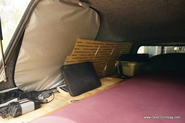 My window covers. The collapsible auto shades work great, along with boxes. Notice the light velcroed to the ceiling.