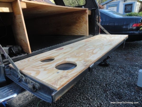 Back tailgate replaced with wood for cooking, sitting, etc. An absolute must do.