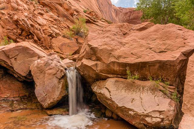 A waterfall along Coyote Gulch - Backpacking Coyote Gulch in Grand Staircase Escalante