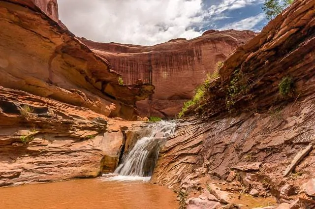 One of the numerous waterfalls along Coyote Gulch - Backpacking Coyote Gulch in Grand Staircase Escalante