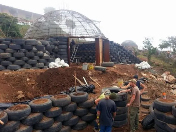 Learn how we turned trash into homes by volunteering to build so-called Earthships outside of Bogota, Colombia