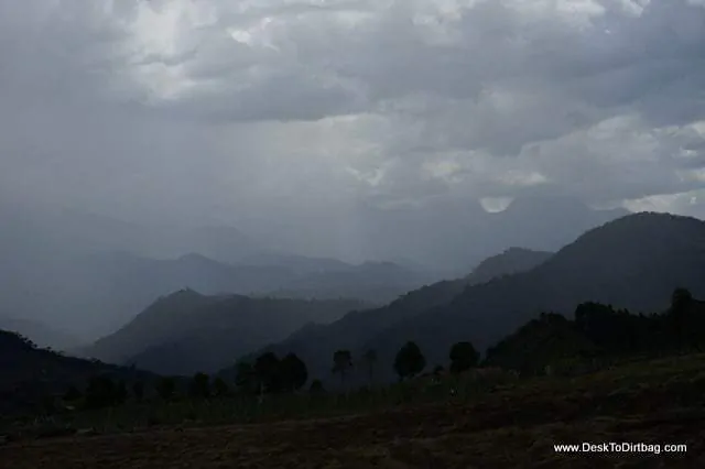 A rain storm descends upon the surrounding mountains.