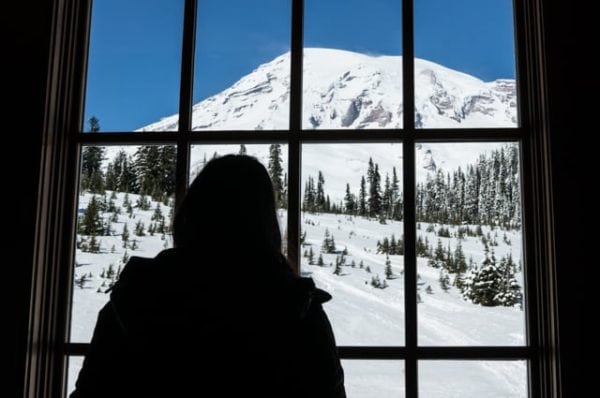 Andrea looking out the window of the visitor center