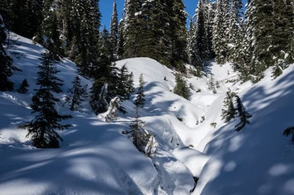 A creek covered in snow.