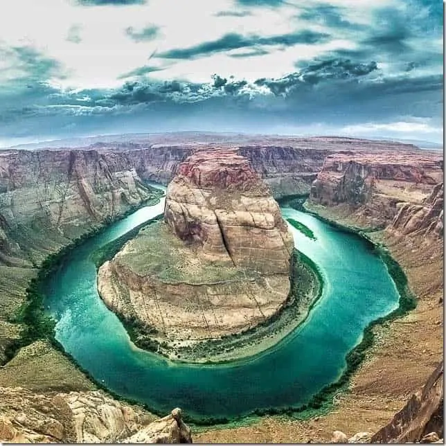 Stand before the incredible Horseshoe Bend near Page, Arizona - 49 Places to Visit on the Ultimate West Coast Road Trip