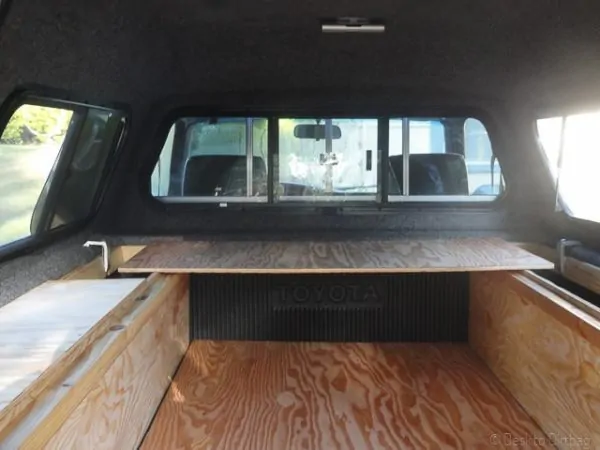 Truck camper backshelf mode
