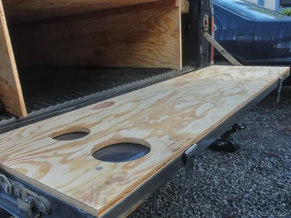 A flat wooden tailgate is a must for truck camping