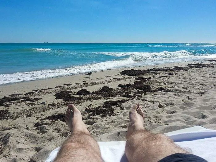 Beach chairs just steps from the waves at the Metropolitan by COMO Miami Beach