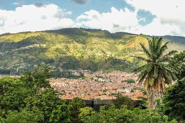 a view of the city of medellin and its mountains