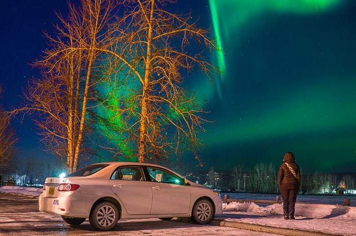 Our rental car in the middle of town, clearly able to see the Aurora. Guide to the Best Time to See the Northern Lights.