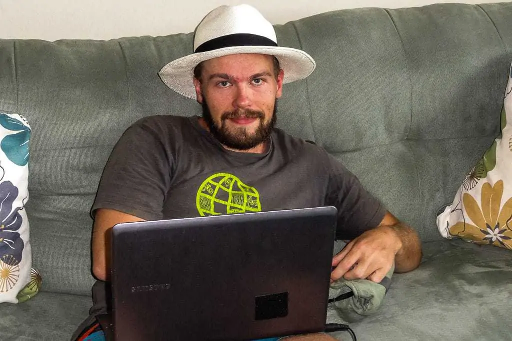 Hard at work on one of my many side hustle jobs, from the comfort of the couch in Panama (and with a Panama Hat, which are actually from Ecuador).
