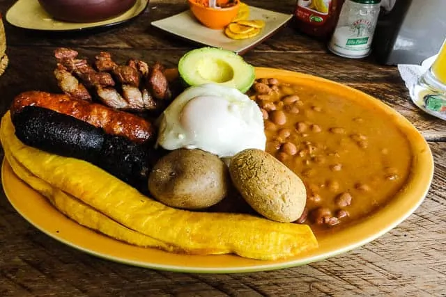 The infamous bandeja paisa - What to Eat in Colombia, a Guide to Colombian Food