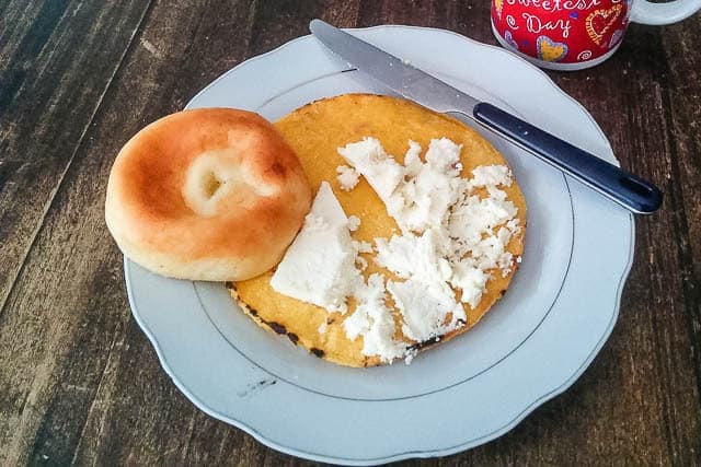 Pan de queso and an arepa - What to Eat in Colombia, a Guide to Colombian Food