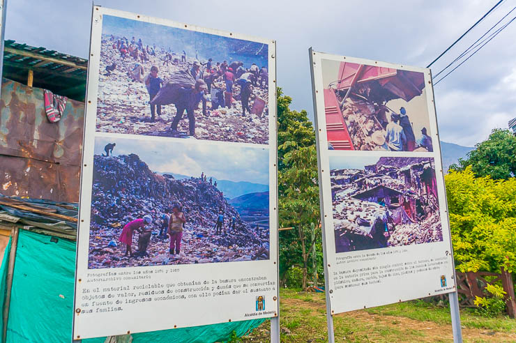 Photos depicting the garbage dump that was Moravia before, what a stark example of a transformation tour in Medellin