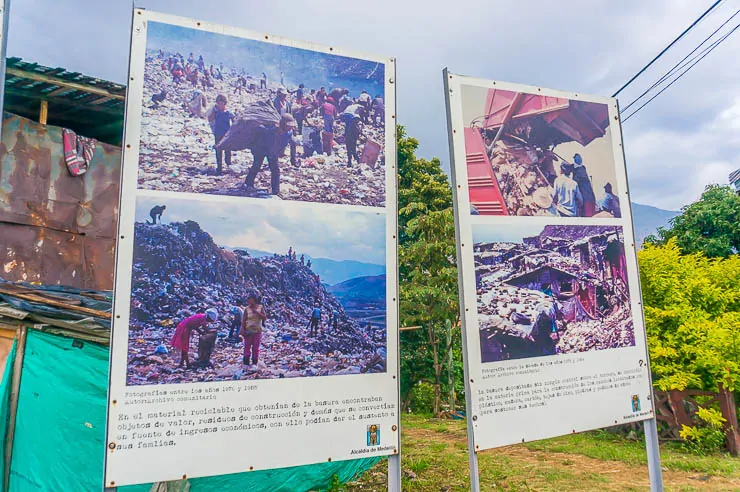 Photos depicting the garbage dump that was Moravia before, what a stark example of a transformation tour in Medellin