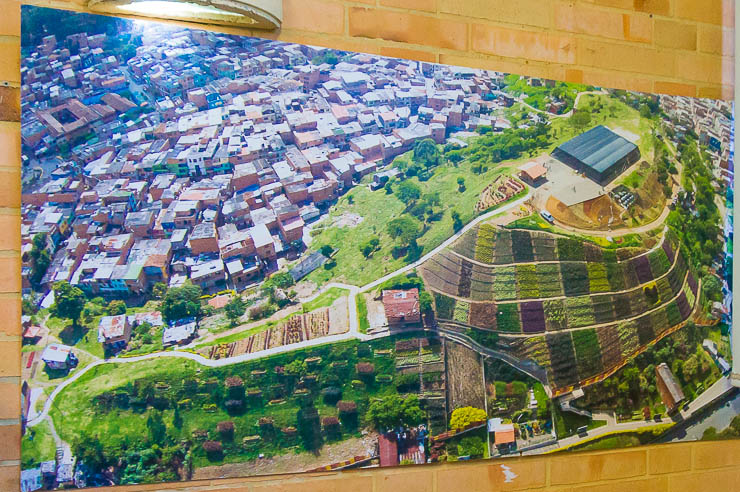 Morro de Moravia Medellin as seen from the air, along with the densely populated neighborhood behind it.