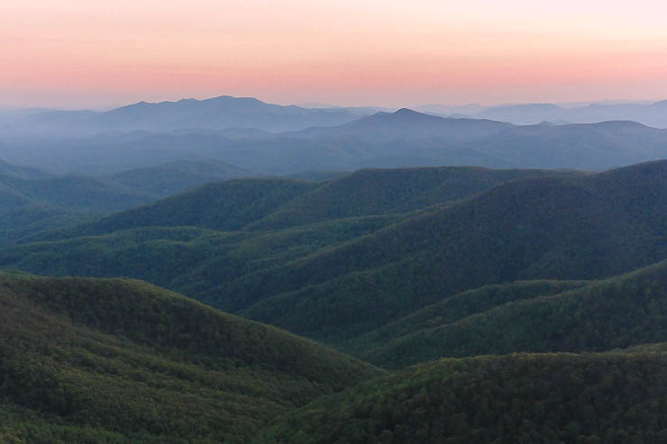 Sun setting on the trail over the Appalachians. Bring a headlamp always! Day Hike Essentials