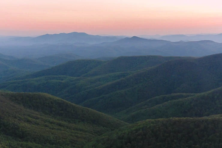 Sun setting on the trail over the Appalachians. Bring a headlamp always! Day Hike Essentials